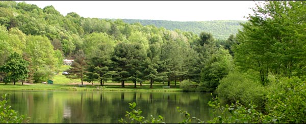 Green mountain landscape and pond at Red Ridge Lake
